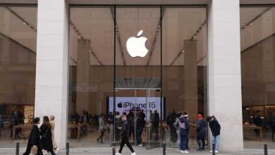 People walk past an Apple Store on March 25, 2024 in Berlin, Germany.